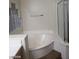 Bathroom features bathtub and shower at 8829 Cornwall Glen Ave, Las Vegas, NV 89129