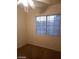 Bedroom with a window and ceiling fan at 8829 Cornwall Glen Ave, Las Vegas, NV 89129