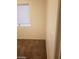 Bedroom featuring window with horizontal blinds and carpet at 8829 Cornwall Glen Ave, Las Vegas, NV 89129