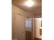 Hallway view into the bathroom and bedroom of the home at 8829 Cornwall Glen Ave, Las Vegas, NV 89129