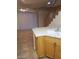 Open concept kitchen and living room with tile floors and natural light at 8829 Cornwall Glen Ave, Las Vegas, NV 89129