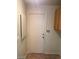 Mud room with a door to the outside, cabinets, keypad and tiled floors at 8829 Cornwall Glen Ave, Las Vegas, NV 89129
