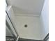 Clean shower stall with white tile and a modern drain at 8829 Cornwall Glen Ave, Las Vegas, NV 89129
