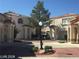 Charming neighborhood featuring well-maintained homes with red tile roofs and landscaped front yards at 8829 Cornwall Glen Ave, Las Vegas, NV 89129