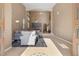 Bright living room featuring high ceilings, natural light, and elegant tile flooring at 885 Violet Hill St, Las Vegas, NV 89110