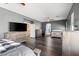 Expansive main bedroom boasts hardwood floors, multiple windows, and access to the Primary bath at 885 Violet Hill St, Las Vegas, NV 89110