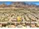 A house pinpoints a home in a residential neighborhood with mountain views at 885 Violet Hill St, Las Vegas, NV 89110