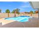 Sparkling pool and spa combination, surrounded by patio space and lush landscaping at 885 Violet Hill St, Las Vegas, NV 89110