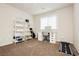 Functional bedroom featuring a desk, shelves and a treadmill at 8929 Sleepy Panda Ave, Las Vegas, NV 89148