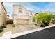 Charming two-story home with a two car garage and low maintenance desert landscaping at 8929 Sleepy Panda Ave, Las Vegas, NV 89148