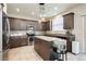 Well-equipped kitchen with stainless steel appliances, granite counters, and center island at 8929 Sleepy Panda Ave, Las Vegas, NV 89148