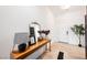 Welcoming hallway features a console table with decor, mirror, and plank accent wall at 8968 Skye Treeline St, Las Vegas, NV 89166