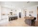 Bright kitchen with white cabinets, a center island, and stainless steel appliances at 8968 Skye Treeline St, Las Vegas, NV 89166