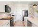 Bright kitchen featuring white cabinetry, stainless appliances at 8968 Skye Treeline St, Las Vegas, NV 89166