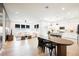 Open concept living space with kitchen, dining and living room at 8968 Skye Treeline St, Las Vegas, NV 89166