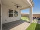 Covered patio featuring a ceiling fan and outdoor seating at 8968 Skye Treeline St, Las Vegas, NV 89166
