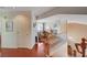 Second floor hallway with wood floors leading to living space at 8983 Emerald Waters Ct, Las Vegas, NV 89147