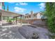 View of backyard featuring a covered patio and block wall at 9021 Feather River Ct, Las Vegas, NV 89117