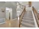Inviting foyer with a staircase and tile flooring, leading to the upper levels of the home at 9021 Feather River Ct, Las Vegas, NV 89117