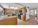 Cozy kitchen with granite countertops, wooden cabinets, and stainless steel appliances at 9021 Feather River Ct, Las Vegas, NV 89117