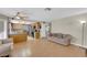 Open-concept living space with ceiling fan, adjacent to the kitchen, perfect for entertaining and gatherings at 9021 Feather River Ct, Las Vegas, NV 89117
