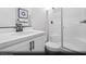 Clean, bright bathroom featuring a white vanity, quartz countertop, and a glass-enclosed shower at 9674 Biedler Ct # Lot 10, Las Vegas, NV 89178