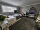 Cozy bedroom with a comfortable bed, modern decor, and bright natural lighting at , Henderson, NV 89015