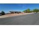 Pleasant single-story house featuring low-maintenance landscaping and charming brick details at , Henderson, NV 89015