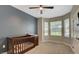 Well-lit bedroom with a large window providing natural light at 10001 Peace Way # 1341, Las Vegas, NV 89147