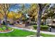 Inviting common area with lush landscaping, BBQ grills, seating, and pathways for community enjoyment at 10001 Peace Way # 1341, Las Vegas, NV 89147