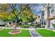 Charming courtyard featuring lush landscaping, outdoor seating, and a built-in grilling area at 10001 Peace Way # 1341, Las Vegas, NV 89147