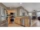 Modern kitchen with stainless steel appliances, light wood cabinets, and an open layout at 10001 Peace Way # 1341, Las Vegas, NV 89147