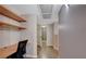 Bright office space with built-in shelves, desk, and tile flooring at 10001 Peace Way # 1341, Las Vegas, NV 89147