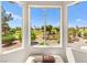 Scenic view from the bay window overlooking the golf course, trees, and blue skies at 10557 Shoalhaven Dr, Las Vegas, NV 89134