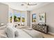 Bright bedroom with scenic views from the bay window and stylish modern furnishings at 10557 Shoalhaven Dr, Las Vegas, NV 89134