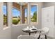 Cozy breakfast nook with views of the golf course and community at 10557 Shoalhaven Dr, Las Vegas, NV 89134