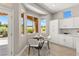 Charming breakfast nook with large windows offering scenic views and ample natural light at 10557 Shoalhaven Dr, Las Vegas, NV 89134