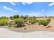 Beautiful desert landscaping surrounds the property and overlooks the manicured golf course at 10557 Shoalhaven Dr, Las Vegas, NV 89134