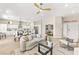 Spacious open-concept living room flows seamlessly into the dining and kitchen area at 10557 Shoalhaven Dr, Las Vegas, NV 89134