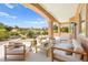 Spacious patio area offering comfortable seating and serene views of the landscaped yard at 10557 Shoalhaven Dr, Las Vegas, NV 89134