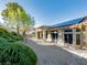 Beautiful home exterior featuring solar panels and well-manicured landscaping at 10709 Hunters Woods Pl, Las Vegas, NV 89134