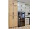 Spacious kitchen with stainless steel refrigerator and elegant cabinetry for ample storage at 10709 Hunters Woods Pl, Las Vegas, NV 89134