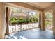 Covered patio area with view to a beautifully landscaped private yard at 10709 Hunters Woods Pl, Las Vegas, NV 89134