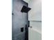 Modern shower featuring a rainfall showerhead and contemporary tile for a luxurious feel at 10709 Hunters Woods Pl, Las Vegas, NV 89134