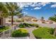 Inviting street view highlights desert landscaping and mountain views at 10709 Hunters Woods Pl, Las Vegas, NV 89134