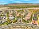 Panoramic aerial view of a well-designed community with mountain views, showcasing a mix of residences at 10809 Garden Mist Dr # 1004, Las Vegas, NV 89135