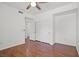Spacious bedroom with wood laminate flooring and a large closet at 10809 Garden Mist Dr # 1004, Las Vegas, NV 89135