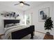 Relaxing bedroom with contemporary decor, natural light and a comfortable queen-sized bed at 10809 Garden Mist Dr # 1004, Las Vegas, NV 89135