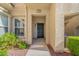 Inviting front entrance with desert landscaping, well-maintained walkway and unit number 1004 at 10809 Garden Mist Dr # 1004, Las Vegas, NV 89135