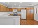 Well-lit kitchen with bright countertops and appliances at 10809 Garden Mist Dr # 1004, Las Vegas, NV 89135